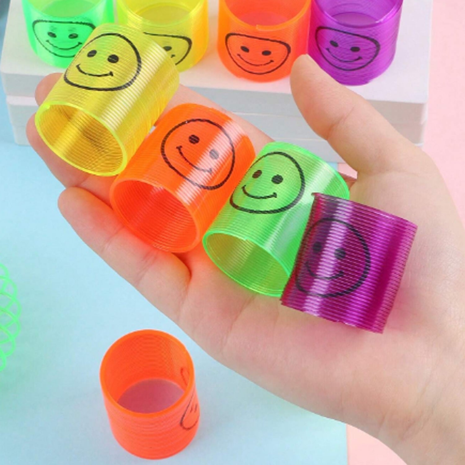 Multicolor Magic Smiley Spring, Spring Toys, Slinky, Slinky Spring Toy, Toy for Kids for Birthdays, Compact and Portable Easy to Carry (12 Pcs Set) Multicolor Magic Smiley Spring, Spring Toys, Slinky, Slinky Spring Toy, Toy for Kids for Birthdays, Compact and Portable Easy to Carry (12 Pcs Set)